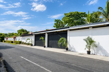 Street view and villa exterior at Palma Roots Villa, Jaco Beach, Costa Rica