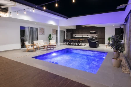 Private swimming pool at night at Palma Roots Villa, Jaco Beach, Costa Rica