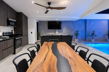 Dining area and pool lighting at Palma Roots Villa, Jaco Beach, Costa Rica